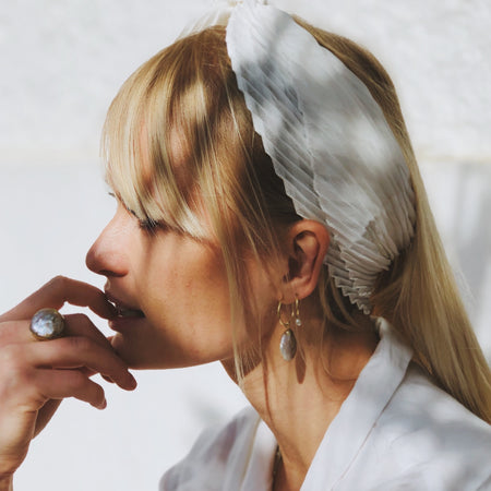 The Tiny Pearl Huggie